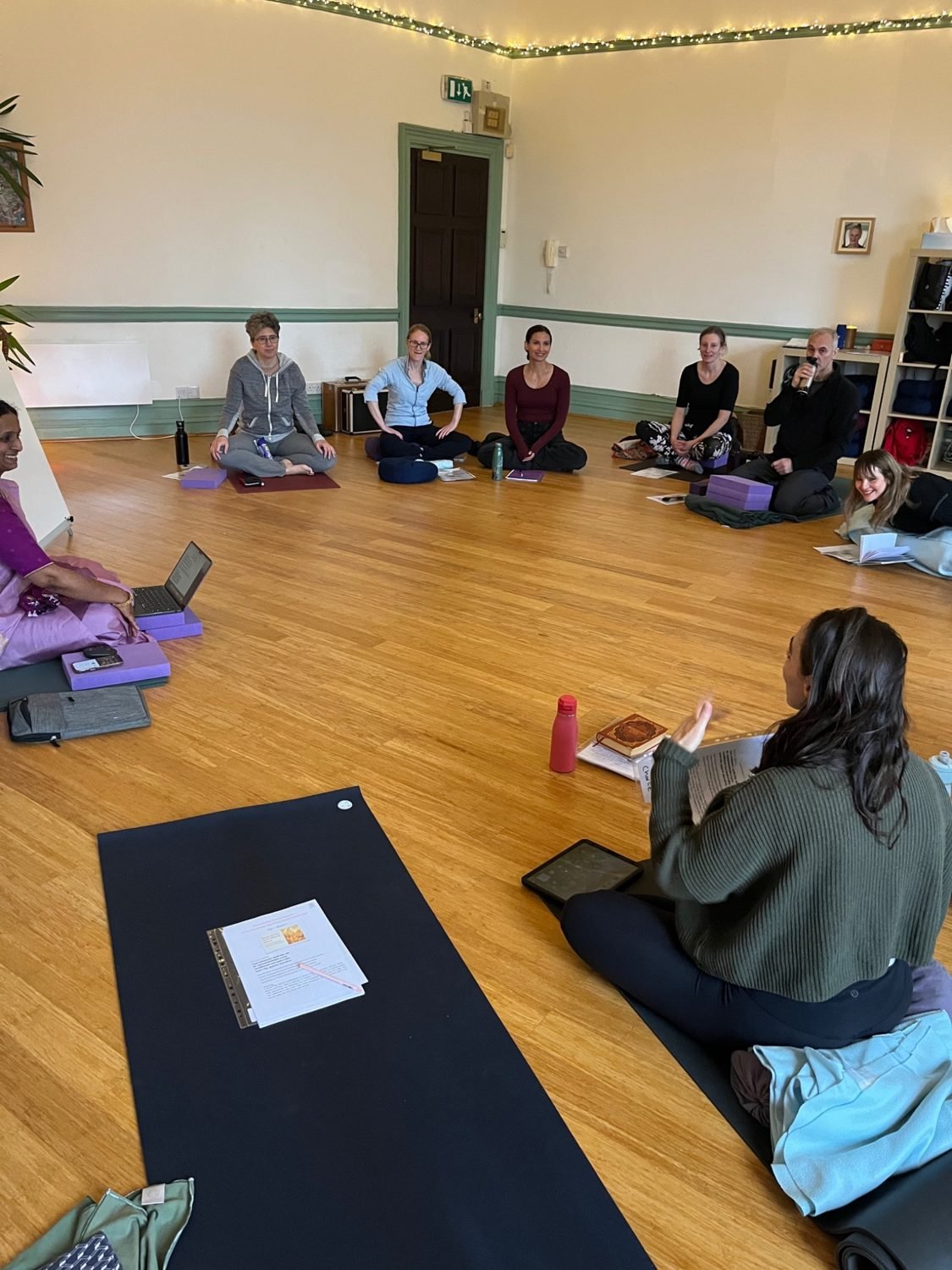 Participants seated in a workshop circle